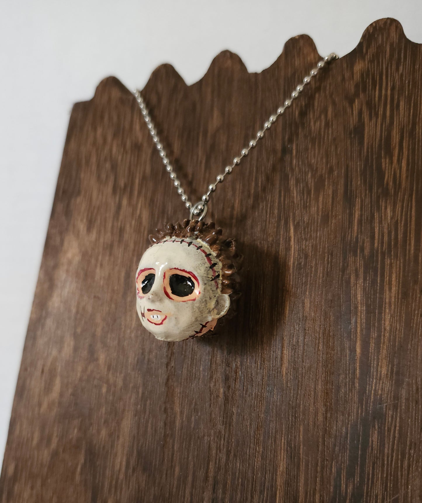 Mr. Skin Suit Necklace